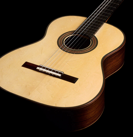 The soundboard of a 2022 Giancarlo Nannoni "Ambrosia" Classical Guitar made of Spruce and Indian rosewood