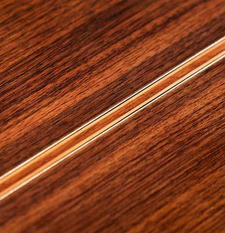 A close-up of the back wood a 2022 Giancarlo Nannoni &quot;Ambrosia&quot; Classical Guitar made of Spruce and Indian rosewood