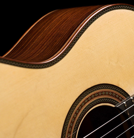 The soundboard and side of a 2022 Giancarlo Nannoni "Ambrosia" Classical Guitar made of Spruce and Indian rosewood