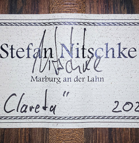 The label of a 2021 Stefan Nitschke "Hauser" classical guitar made with spruce and CSA rosewood