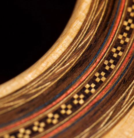 Closeup detail of the rosette of a 2021 Stefan Nitschke "Hauser" classical guitar made with spruce and CSA rosewood