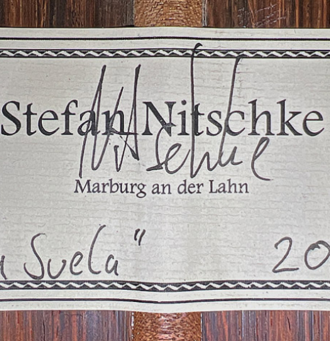 The label of a 2022 Stefan Nitschke &quot;Hauser&quot; classical guitar made with spruce and CSA rosewood