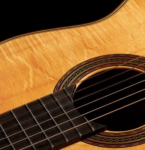 The soundboard and rosette of a 2023 Stefan Nitschke "Hauser" classical guitar made with spruce and CSA rosewood