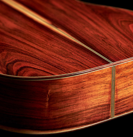The back and sides at the foot of a 2023 Stefan Nitschke "Hauser" classical guitar made with spruce and CSA rosewood