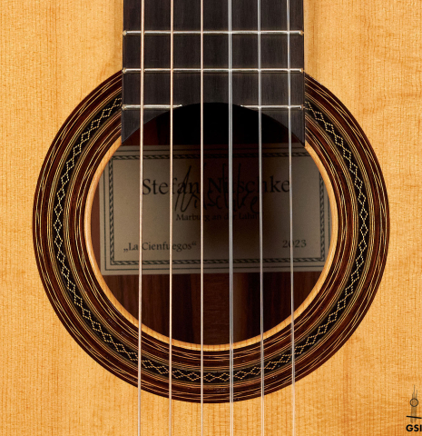 The rosette of a 2023 Stefan Nitschke "Hauser" classical guitar made with spruce and CSA rosewood