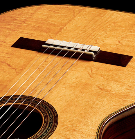 The soundboard and bridge of a 2023 Stefan Nitschke "Hauser" classical guitar made with spruce and CSA rosewood