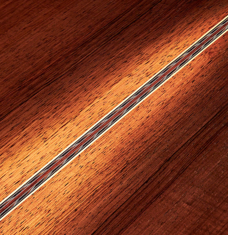 A close-up of the back of a 2020 Stefan Nitschke &quot;1912 Manuel Ramirez&quot; classical guitar made of spruce and CSA rosewood. 
