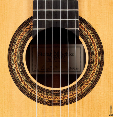 The rosette of a 2020 Stefan Nitschke &quot;1912 Manuel Ramirez&quot; classical guitar made of spruce and CSA rosewood. 