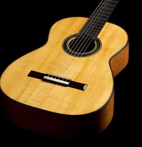The top and sides of a 2023 Stefan Nitschke "Vicente Arias" classical guitar made of spruce and cypress