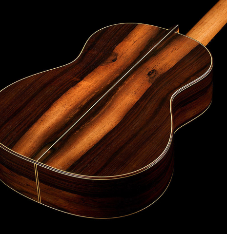 The back and sides of a 2024 Stefan Nitschke "Santos" classical guitar made of spruce and CSA rosewood