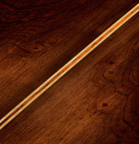The back center seam of a 2019 Stefan Nitschke "Romanillos" classical guitar made of spruce and CSA rosewood