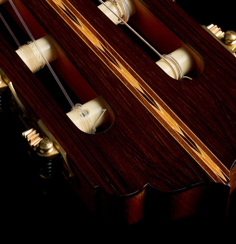 The headstock veneer and tuning machines of a 2019 Stefan Nitschke "Romanillos" classical guitar made of spruce and CSA rosewood