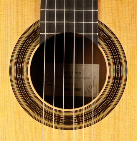 The rosette of a 1992 Ober/Blochinger classical guitar made of spruce and CSA rosewood
