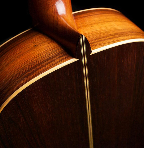 The back and heel joint of a 1992 Ober/Blochinger classical guitar made of spruce and CSA rosewood