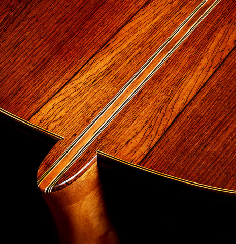 The heel, back binding and purflings of a 2019 Fritz Ober classical guitar made of spruce and CSA rosewood