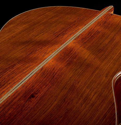 The back center seam of a 1997 Fritz Ober classical guitar made of spruce and CSA rosewood