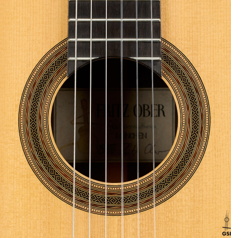 The rosette of a 1997 Fritz Ober classical guitar made of spruce and CSA rosewood