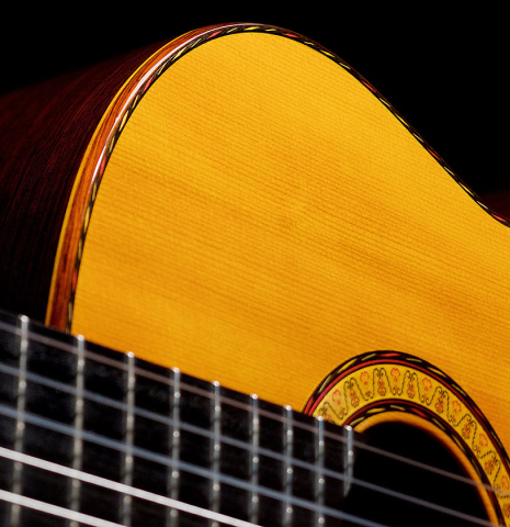 The soundboard, inlay and side of a 2004 Jose Oribe &quot;Suprema&quot; classical guitar made of spruce and CSA rosewood