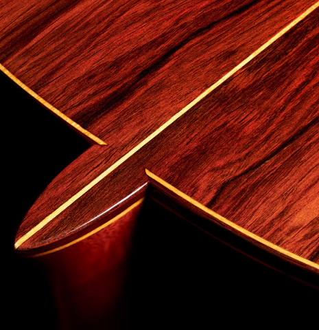 The heel of a 1964 Jose Oribe classical guitar made of spruce and CSA rosewood