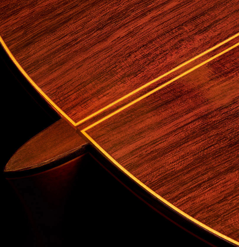 The back, heel and center seam purflings of a 1980's Jose Oribe "Classic Professional A" classical guitar made of cedar and Indian rosewood