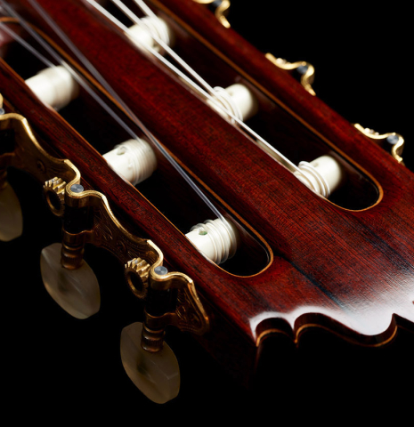 The headstock and tuning machines of a 1977 Jose Oribe "Calidad Suprema" classical guitar made of cedar and CSA rosewood