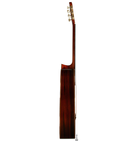 The side of a 1977 Jose Oribe "Calidad Suprema" classical guitar made of cedar and CSA rosewood
