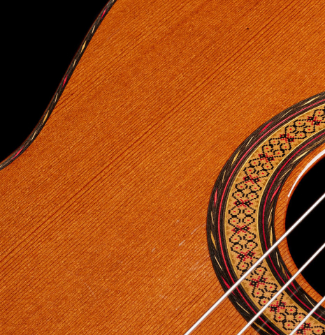 The soundboard and rosette of a 1977 Jose Oribe "Calidad Suprema" classical guitar made of cedar and CSA rosewood