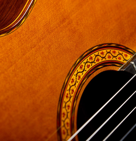 The soundboard and rosette of a 1987 Jose Oribe "Gran Suprema" (ex Scott Tennant) classical guitar made of cedar and CSA rosewood