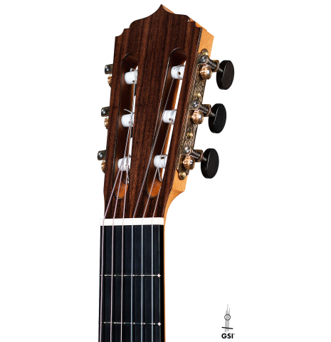 The headstock of a 2021 Darragh O'Connell classical guitar made of cedar and Indian rosewood