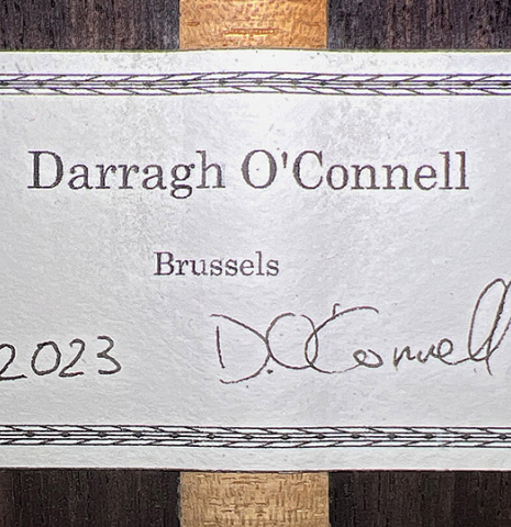 The label of a 2023 Darragh O'Connell classical guitar made of cedar and Indian rosewood