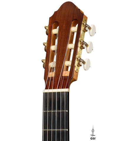 The headstock of a 2026 Alexis Parducci classical guitar made of spruce and African rosewood