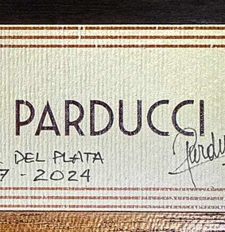 The label of a 2024 Alexis Parducci "Llobet" classical guitar made of spruce and CSA rosewood