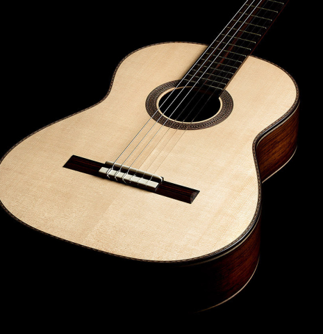 The soundboard of a 2024 Alexis Parducci "Llobet" classical guitar made of spruce and CSA rosewood