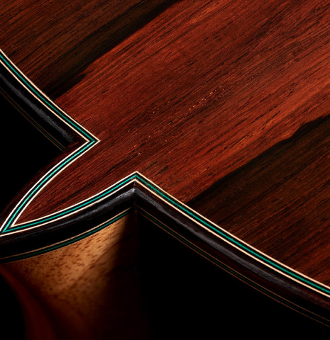The heel, back binding and purflings of a 2024 Teodoro Perez "Maestro" classical guitar made of cedar and African rosewood