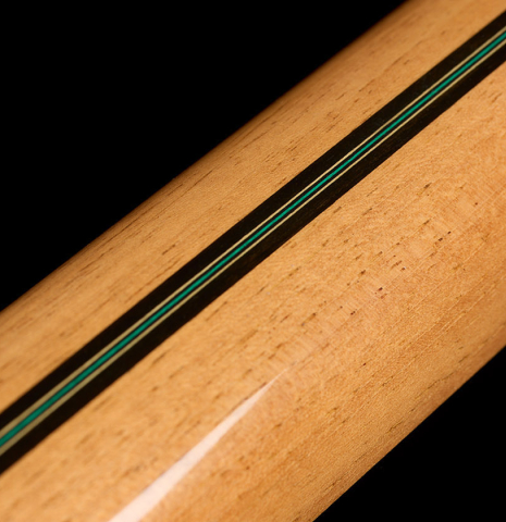 The neck with ebony re-enforcement of a 2025 Teodoro Perez "Maestro" classical guitar made of cedar and African rosewood