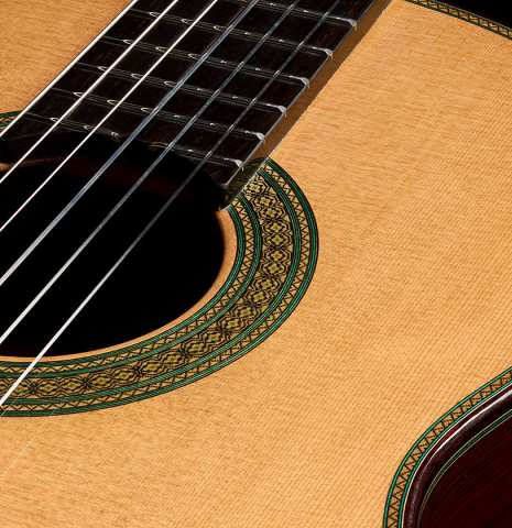The soundboard and rosette of a 2025 Teodoro Perez "Maestro" classical guitar made of cedar and African rosewood