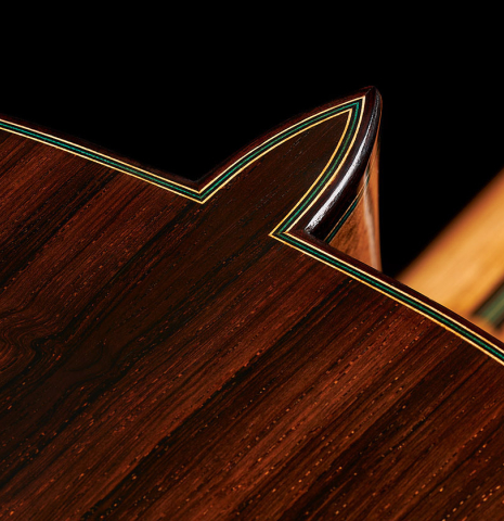 The back at heel with purfling of a 2024 Teodoro Perez "Maestro" classical guitar made of spruce and African rosewood