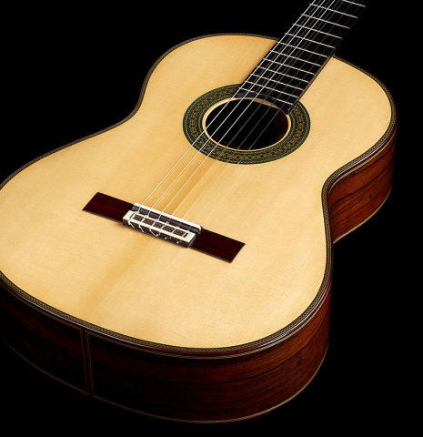 The soundboard and sides of a 2024 Teodoro Perez "Maestro" classical guitar made of spruce and African rosewood