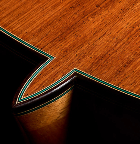The heel, back binding and purfling of a 2025 Teodoro Perez "Maestro" classical guitar made of spruce and African rosewood