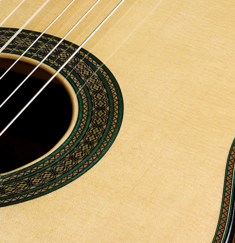 The soundboard and rosette detail of a 2025 Teodoro Perez "Maestro" classical guitar made of spruce and African rosewood