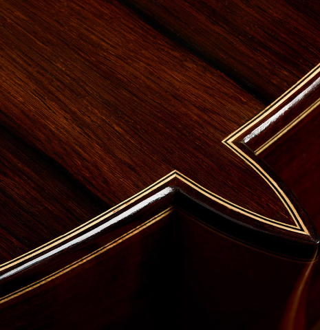 The heel, back binding and purfling of a 2025 Teodoro Perez "Concierto" classical guitar made of spruce and African rosewood