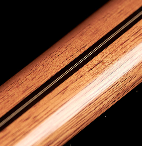 The nekc of a 2023 Teodoro Perez "Concierto" classical guitar made of cedar and Indian rosewood.