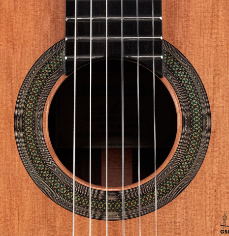 The rosette of a 2023 Teodoro Perez "Concierto" classical guitar made of cedar and Indian rosewood.