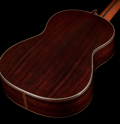 The back and sides at the foot of a 2024 Teodoro Perez "Concierto" classical guitar made of cedar and Indian rosewood.