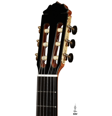 The headstock of a 2024 Teodoro Perez "Concierto" classical guitar made of cedar and Indian rosewood.