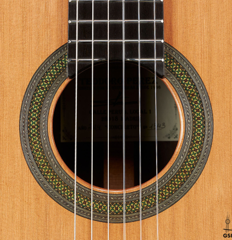 The rosette of a 2024 Teodoro Perez "Concierto" classical guitar made of cedar and Indian rosewood.