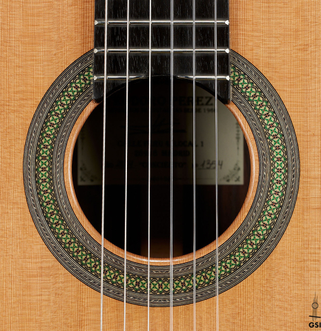 The rosette of a 2024 Teodoro Perez "Concierto" classical guitar made of cedar and Indian rosewood.