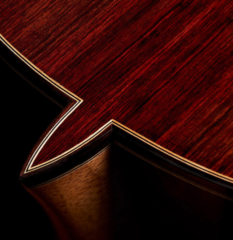 The heel, back binding and purfling of a 2025 Teodoro Perez "Concierto" classical guitar made of cedar and Indian rosewood.