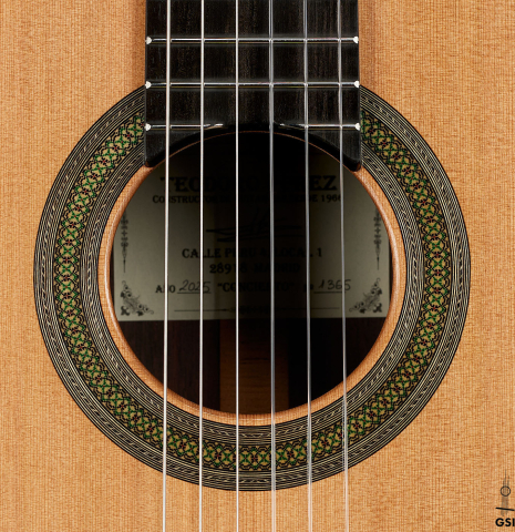 The rosette of a 2025 Teodoro Perez "Concierto" classical guitar made of cedar and Indian rosewood.