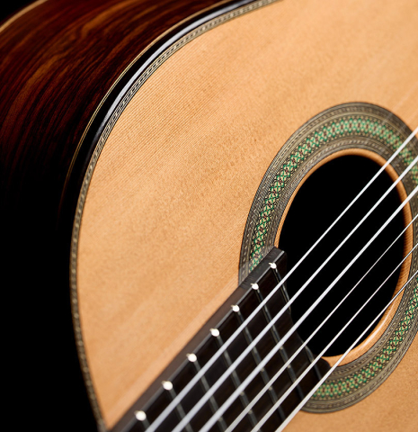 The soundboard, fingerboard and rosette of a 2026 Teodoro Perez "Concierto" classical guitar made of cedar and Indian rosewood
